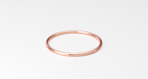 Link to buy a 1mm ultra thin full-round rose gold ring band on Etsy